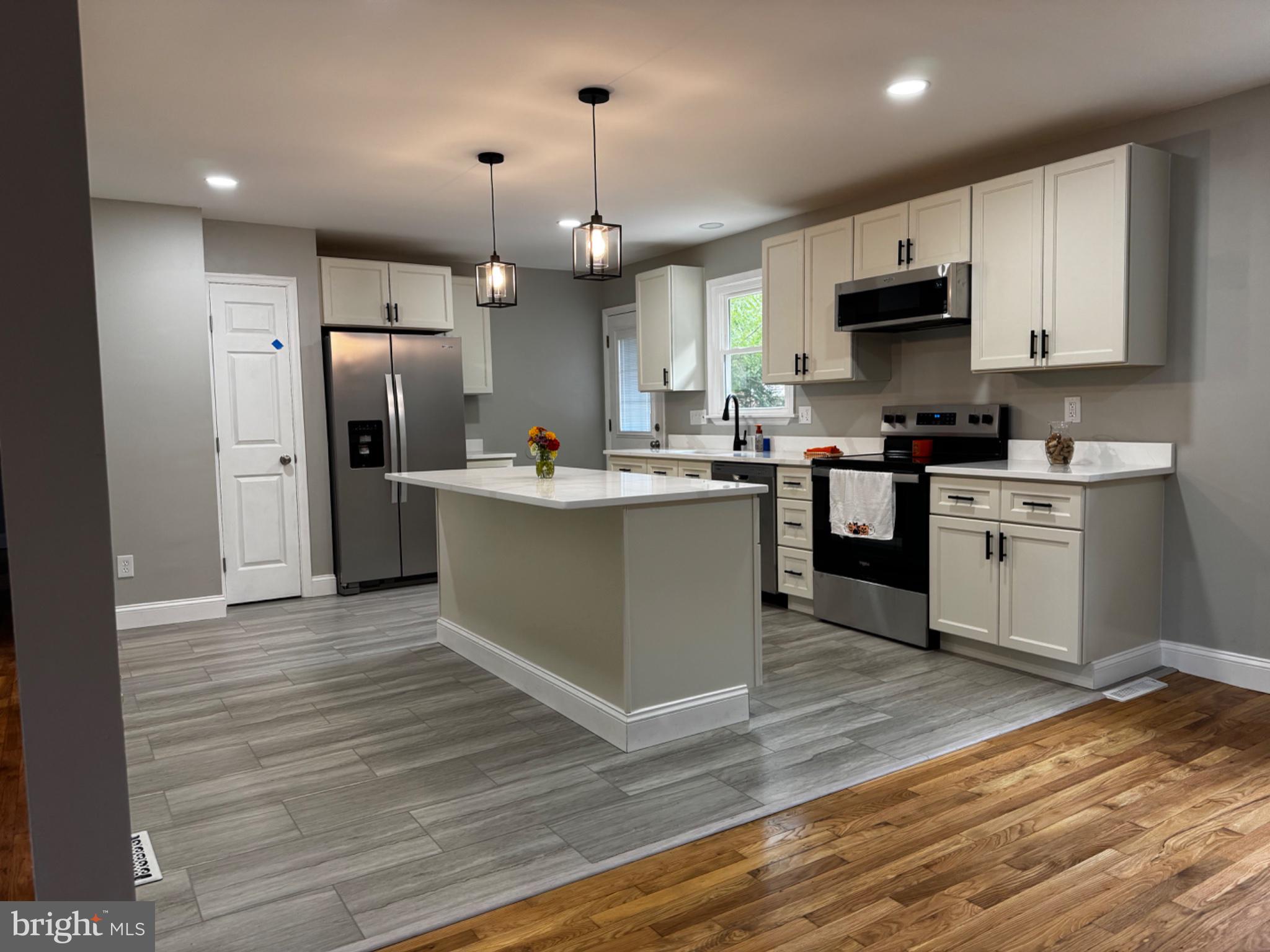 3719 Dublin Road Darlington, MD 21034 - Photo 4 of 28 Open kitchen with large is all and quartz counters