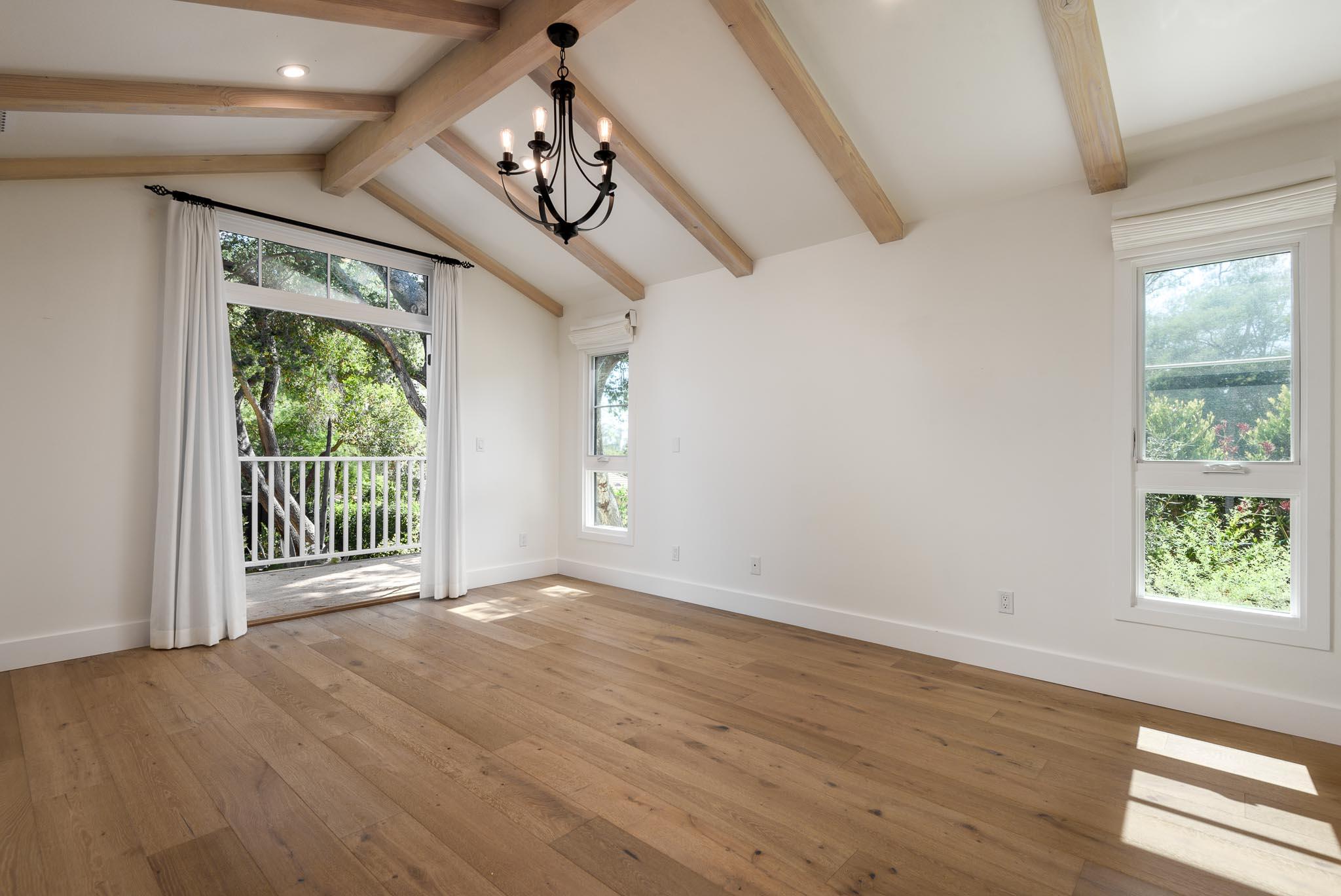 765 B Hot Springs Road Montecito, CA 93108 - Photo 16 of 33 a view of an empty room with wooden floor and a window
