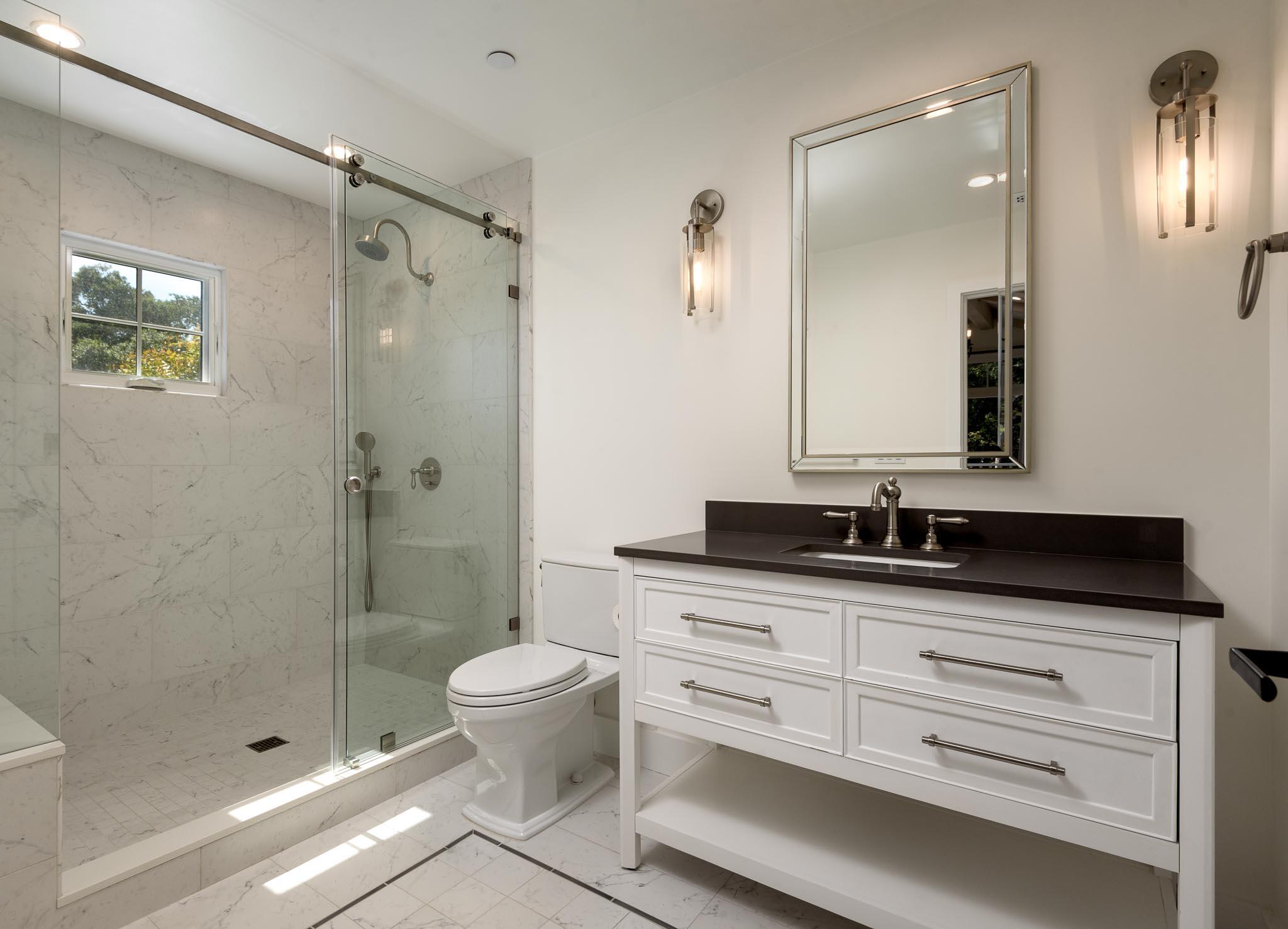 765 B Hot Springs Road Montecito, CA 93108 - Photo 17 of 33 a bathroom with a granite countertop sink toilet mirror and shower