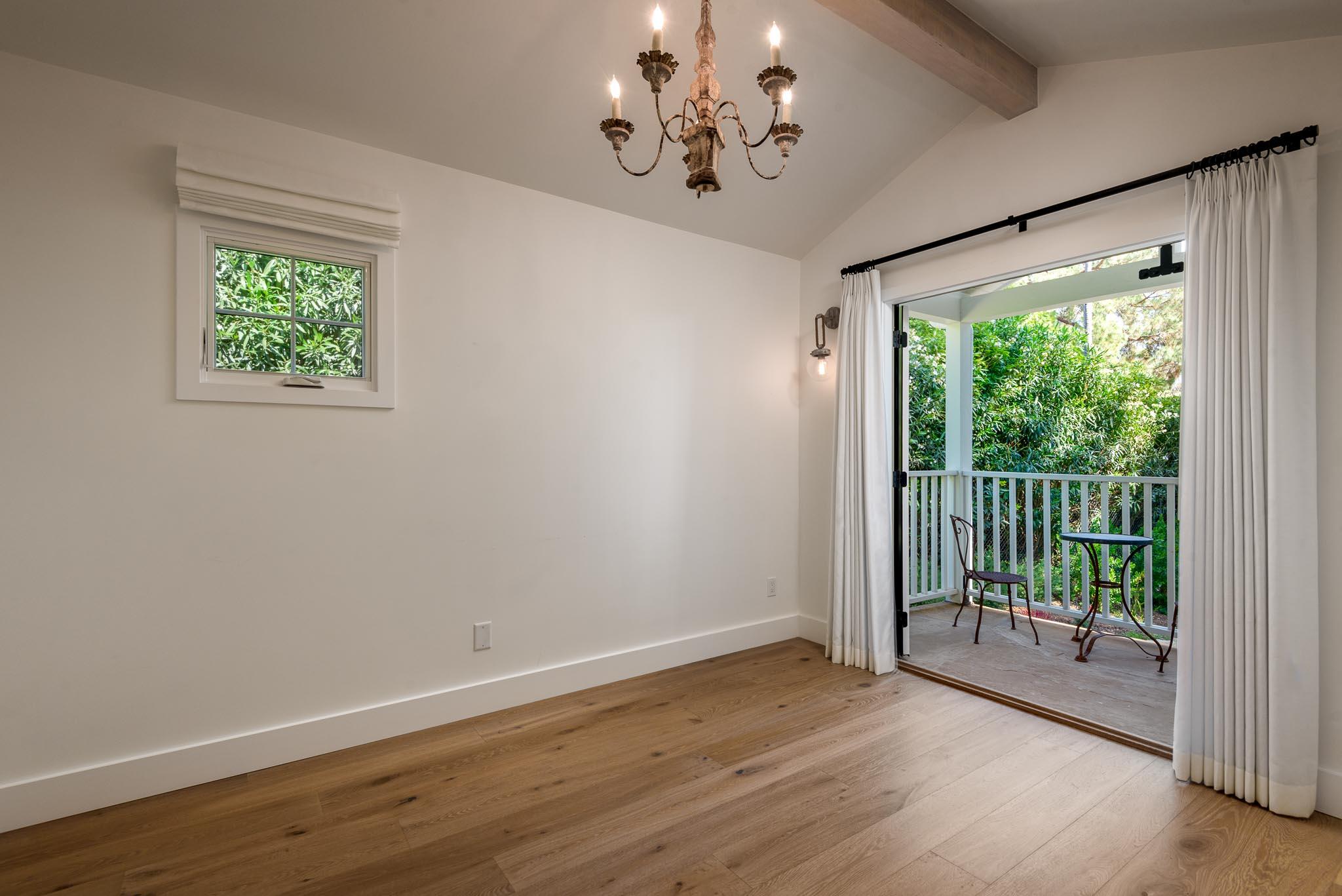 765 B Hot Springs Road Montecito, CA 93108 - Photo 18 of 33 wooden floor in an empty room with a window