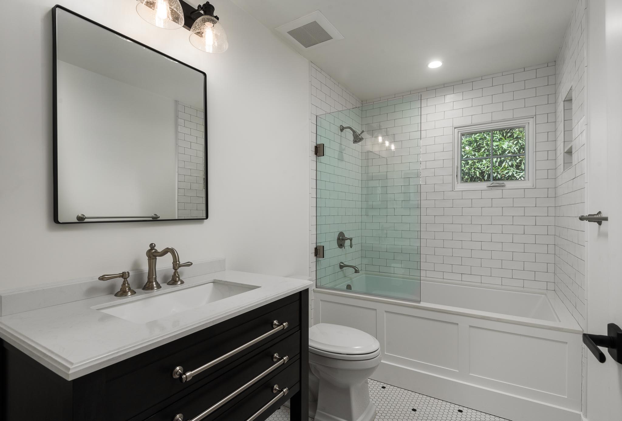 765 B Hot Springs Road Montecito, CA 93108 - Photo 19 of 33 a bathroom with a sink vanity granite toilet tub and shower