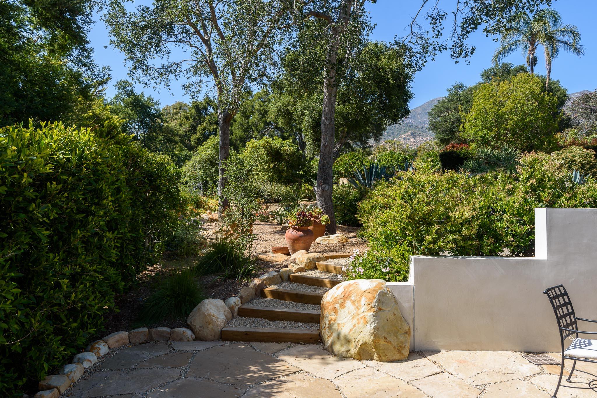 765 B Hot Springs Road Montecito, CA 93108 - Photo 22 of 33 a view of a patio with couches and a fire pit