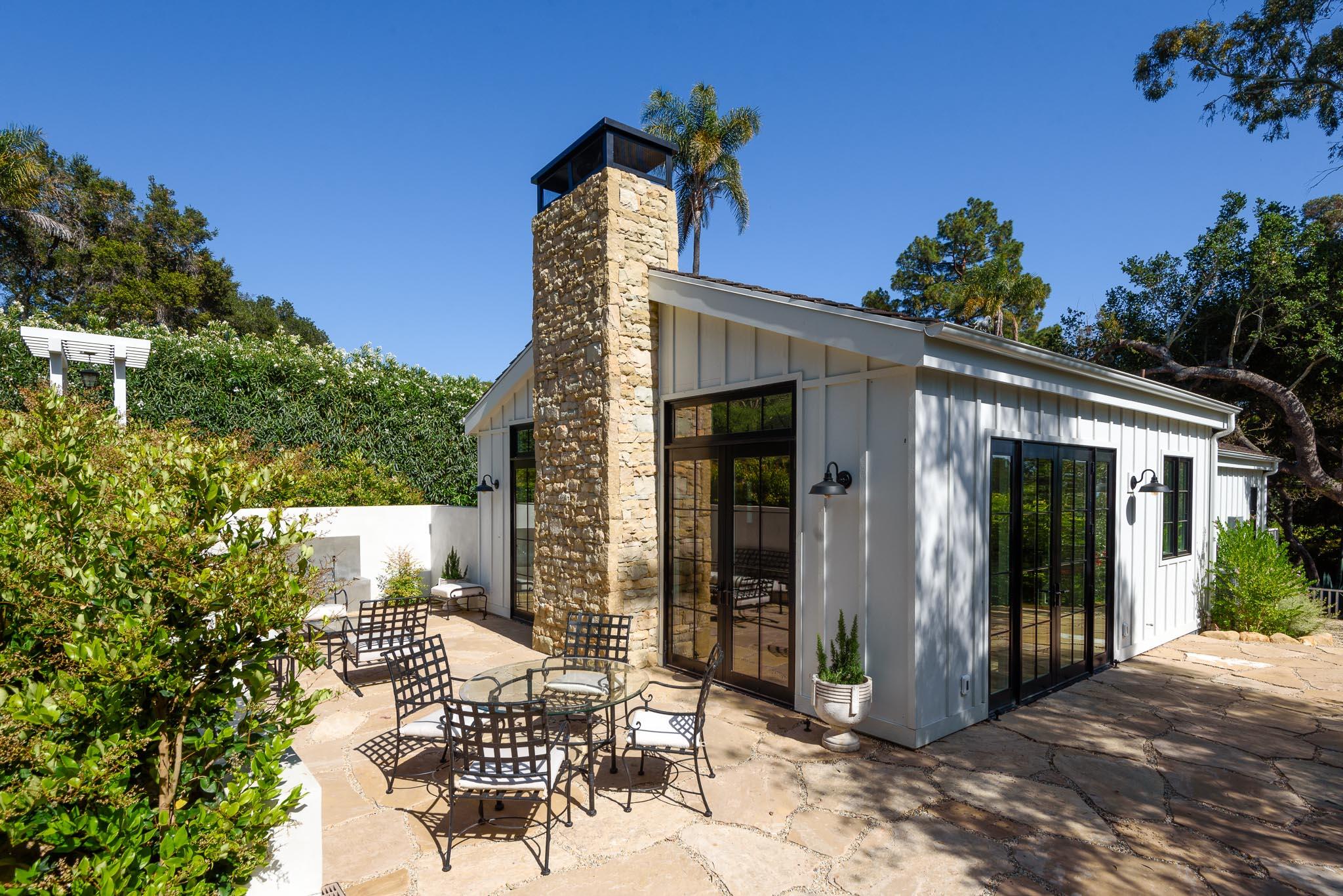 765 B Hot Springs Road Montecito, CA 93108 - Photo 30 of 33 a view of a patio with table and chairs and potted plants
