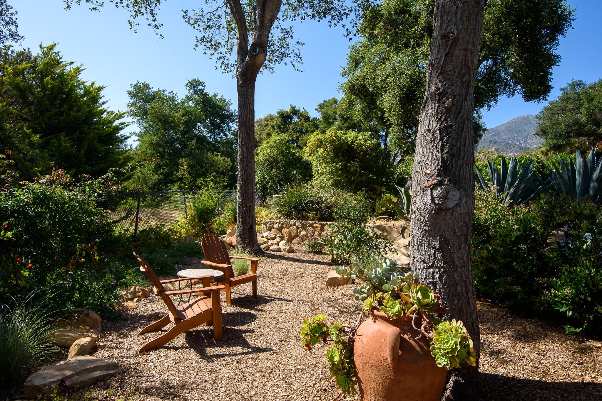 765 B Hot Springs Road Montecito, CA 93108 - Photo 31 of 33 a view of a bench in a backyard