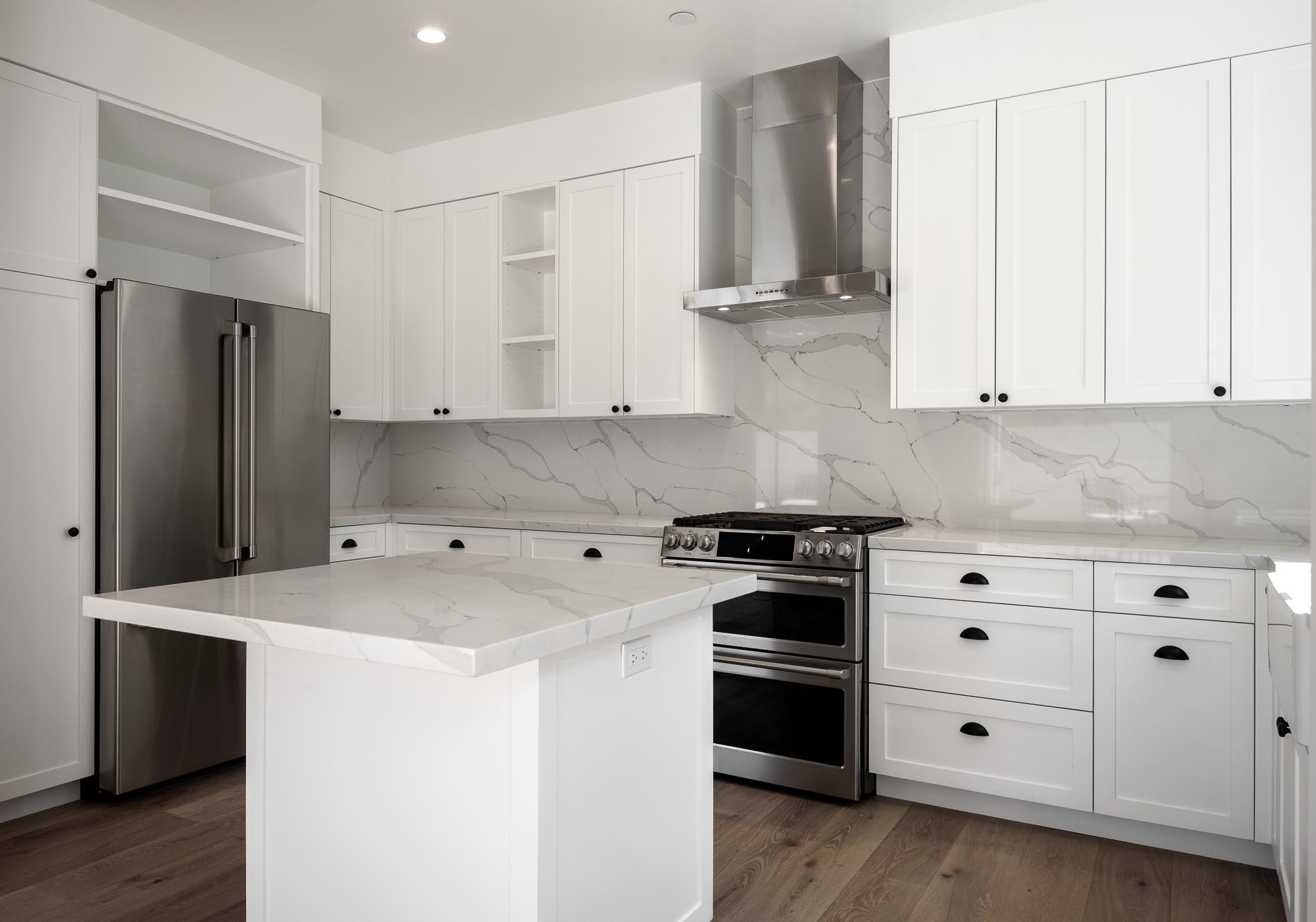 765 B Hot Springs Road Montecito, CA 93108 - Photo 9 of 33 a kitchen with stainless steel appliances white cabinets and a refrigerator