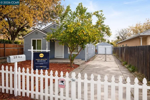 a front view of house with yard