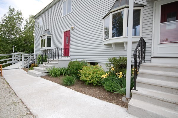 33 Osgood Road Sterling, MA 01564 - Photo 19 of 30 a front view of a house with garden