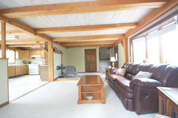33 Osgood Road Sterling, MA 01564 - Photo 23 of 30 a living room with furniture and a large window