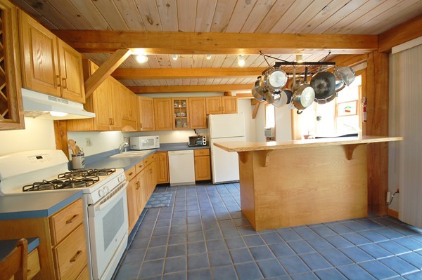 33 Osgood Road Sterling, MA 01564 - Photo 4 of 30 a kitchen with stainless steel appliances granite countertop a stove a sink and a refrigerator