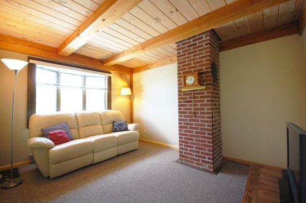 33 Osgood Road Sterling, MA 01564 - Photo 7 of 30 a living room with furniture and a window