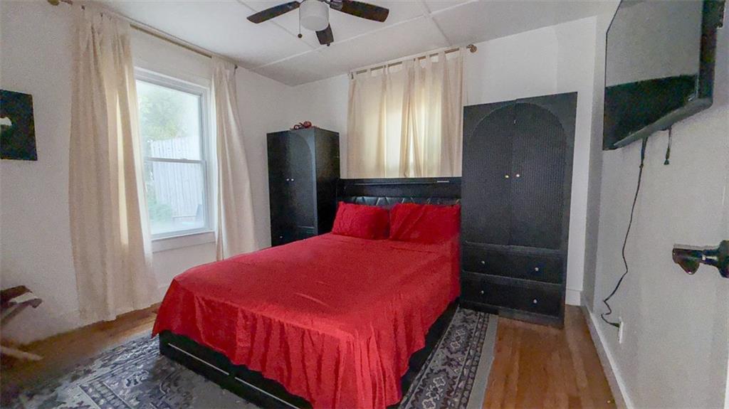 1450 Hawthorne Way East Point, GA 30344 - Photo 11 of 16 a bedroom with a bed closet and a window