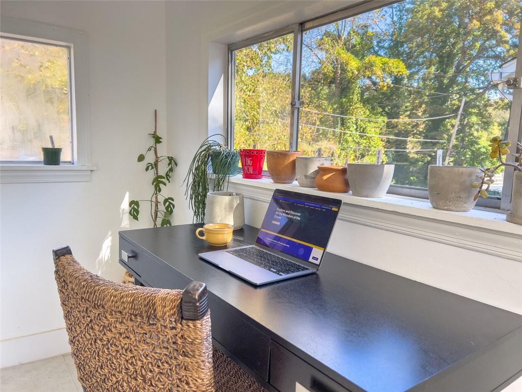 1450 Hawthorne Way East Point, GA 30344 - Photo 13 of 16 a view of table and chair with a window