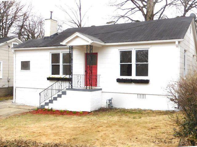 1450 Hawthorne Way East Point, GA 30344 - Photo 2 of 16 a view of a house with snow on the background