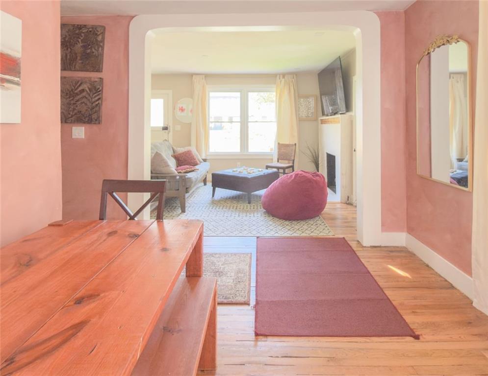 1450 Hawthorne Way East Point, GA 30344 - Photo 5 of 16 a bedroom with furniture and window