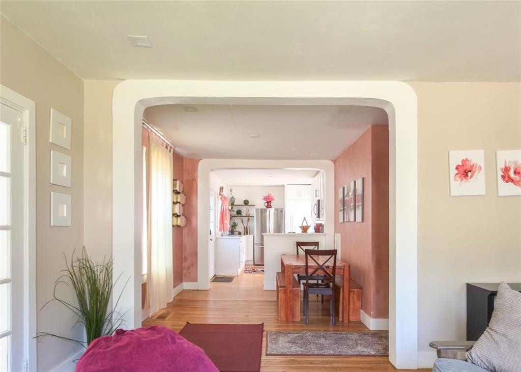 1450 Hawthorne Way East Point, GA 30344 - Photo 6 of 16 a living room with furniture and a potted plant