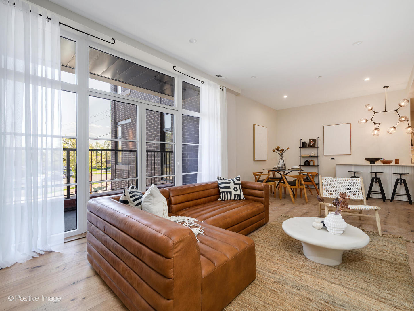 11 West Prospect Avenue, Unit 411 Mount Prospect, IL 60056 - Photo 15 of 71 a living room with furniture and a large window
