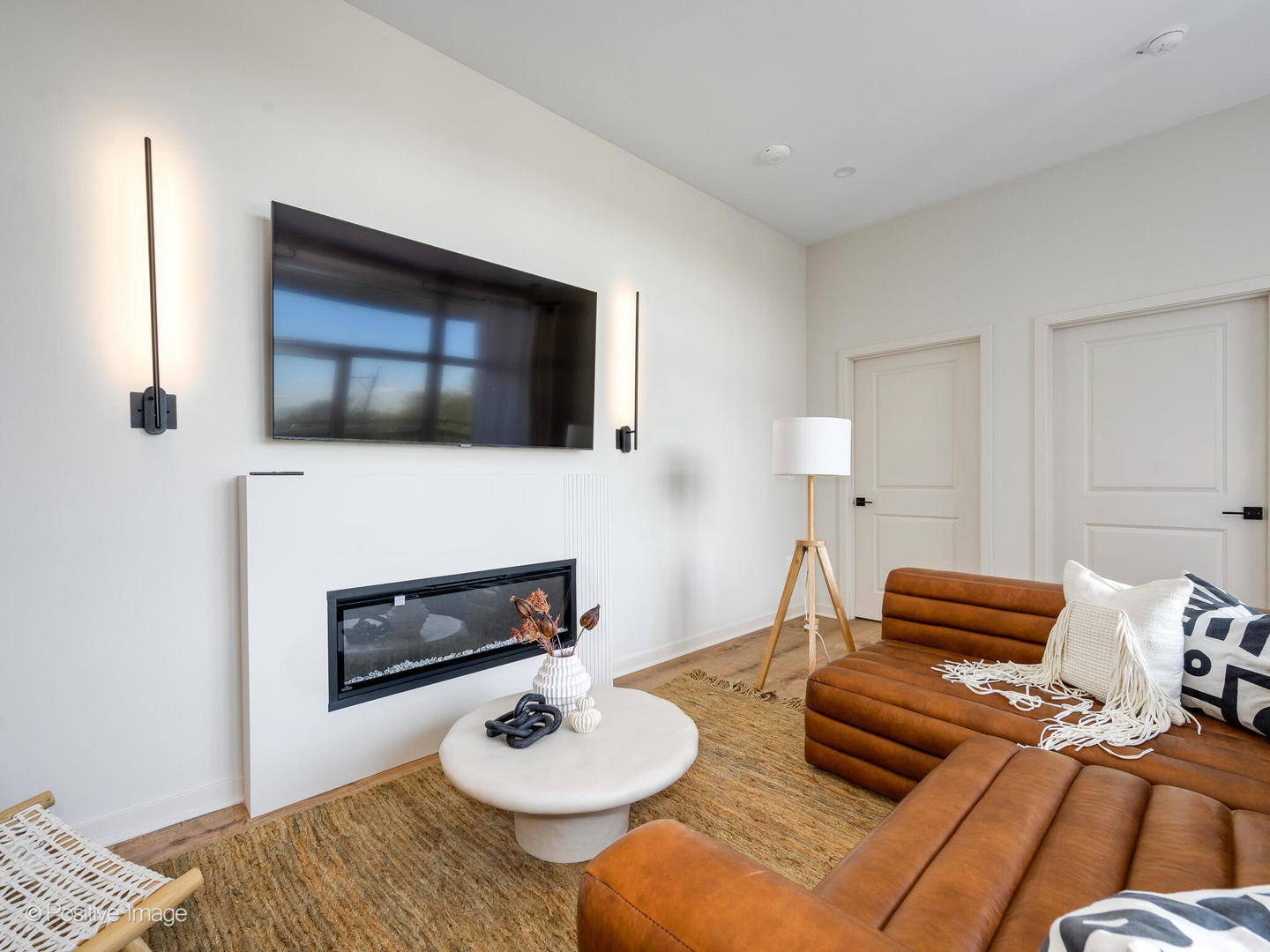 11 West Prospect Avenue, Unit 411 Mount Prospect, IL 60056 - Photo 17 of 71 a living room with furniture and a fireplace