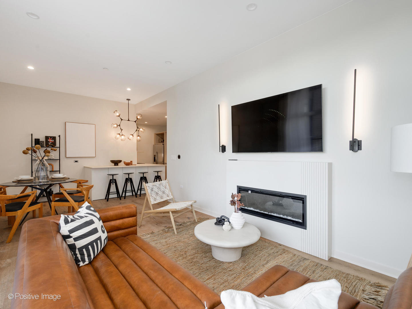 11 West Prospect Avenue, Unit 411 Mount Prospect, IL 60056 - Photo 18 of 71 a living room with furniture and a flat screen tv