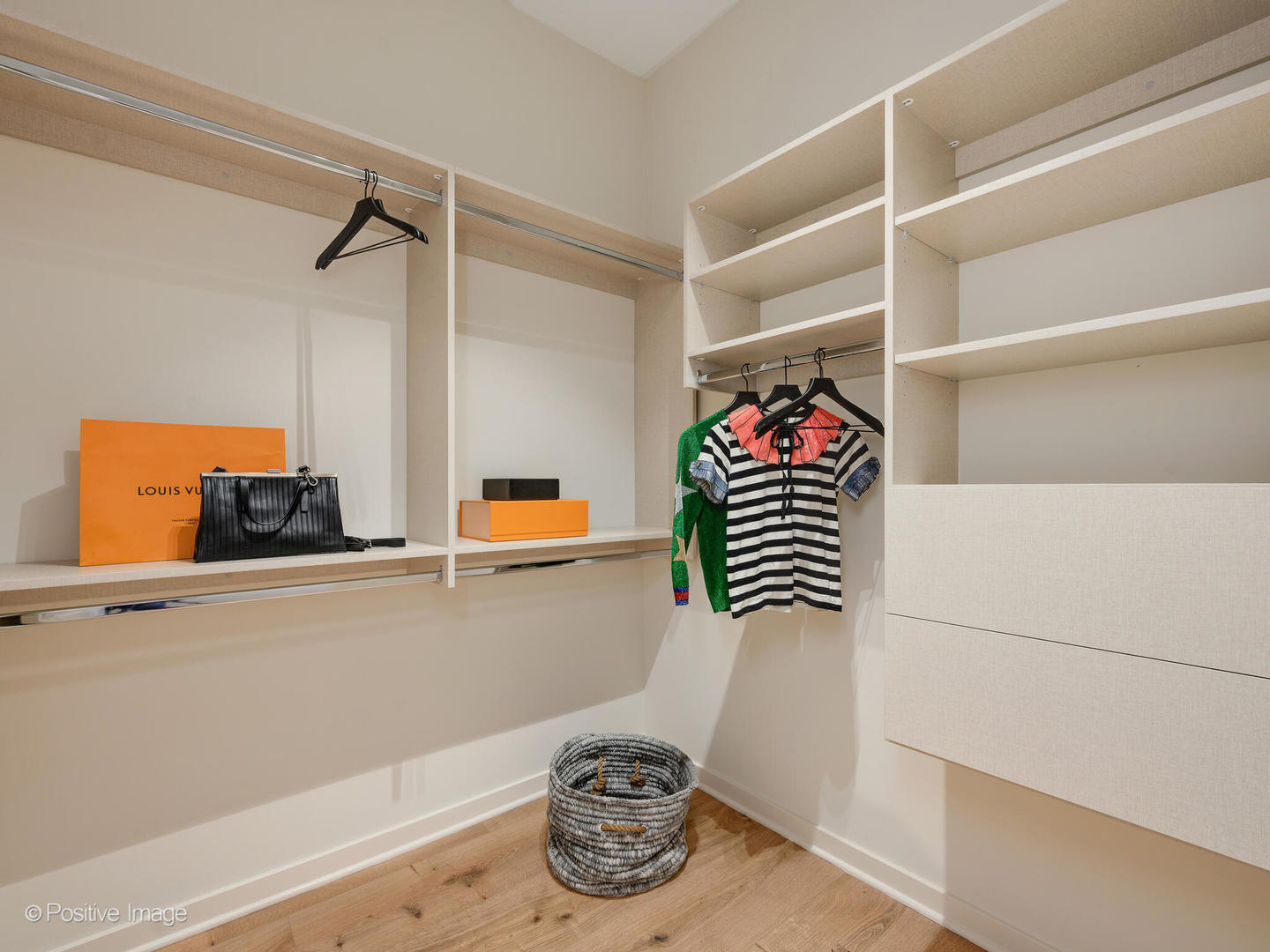 11 West Prospect Avenue, Unit 411 Mount Prospect, IL 60056 - Photo 21 of 71 a view of walk in closet with clothes and shoes