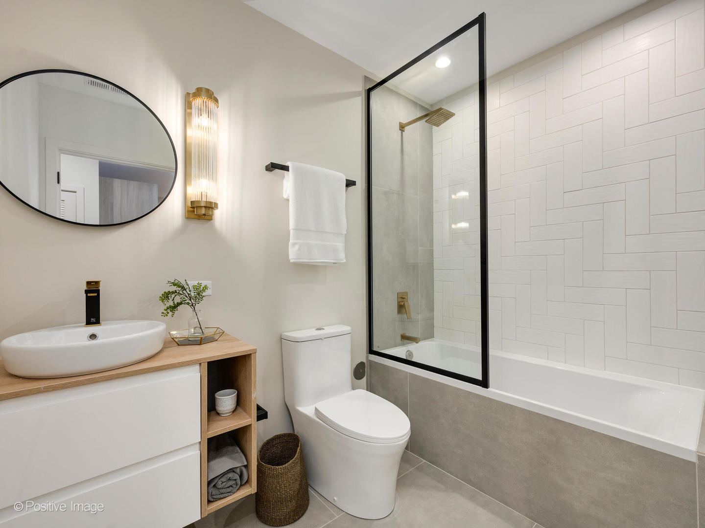 11 West Prospect Avenue, Unit 411 Mount Prospect, IL 60056 - Photo 24 of 71 a bathroom with a sink toilet and shower