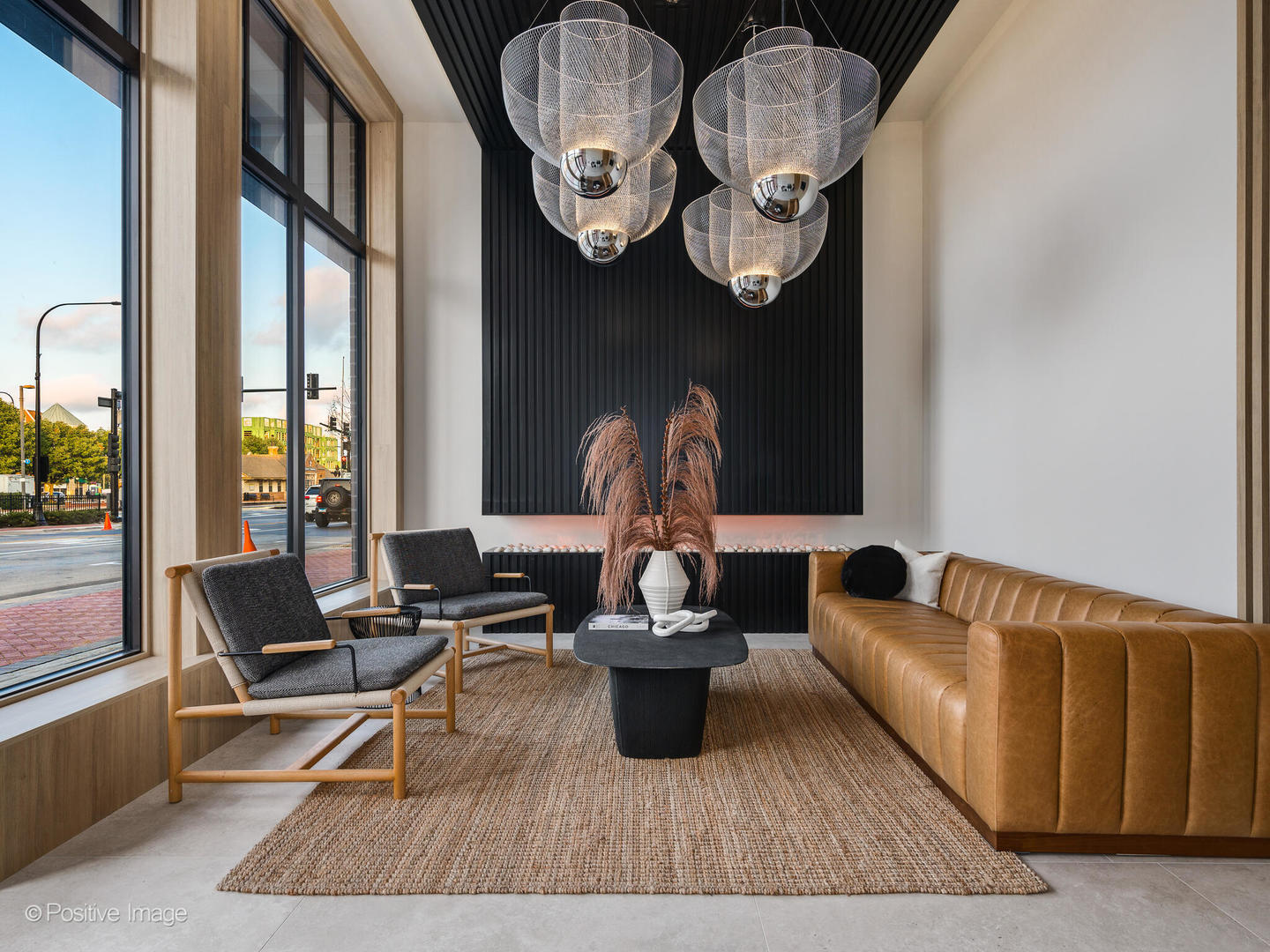 11 West Prospect Avenue, Unit 411 Mount Prospect, IL 60056 - Photo 4 of 71 a living room with furniture wooden floor and a large window