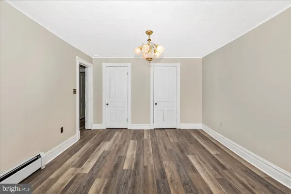 a view of a room with racks on the wall