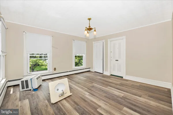 a view of an empty room with a garage