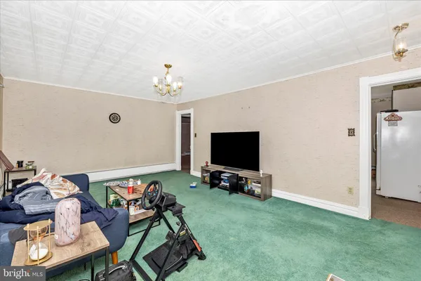 a view of a big room with wooden walls