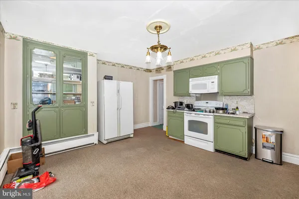 a view of a house with a street