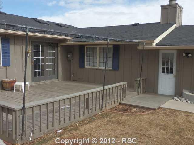 18 Mountain View Road Manitou Springs, CO 80829 - Photo 19 of 22 Large Deck with an Awning in the Rear Yard