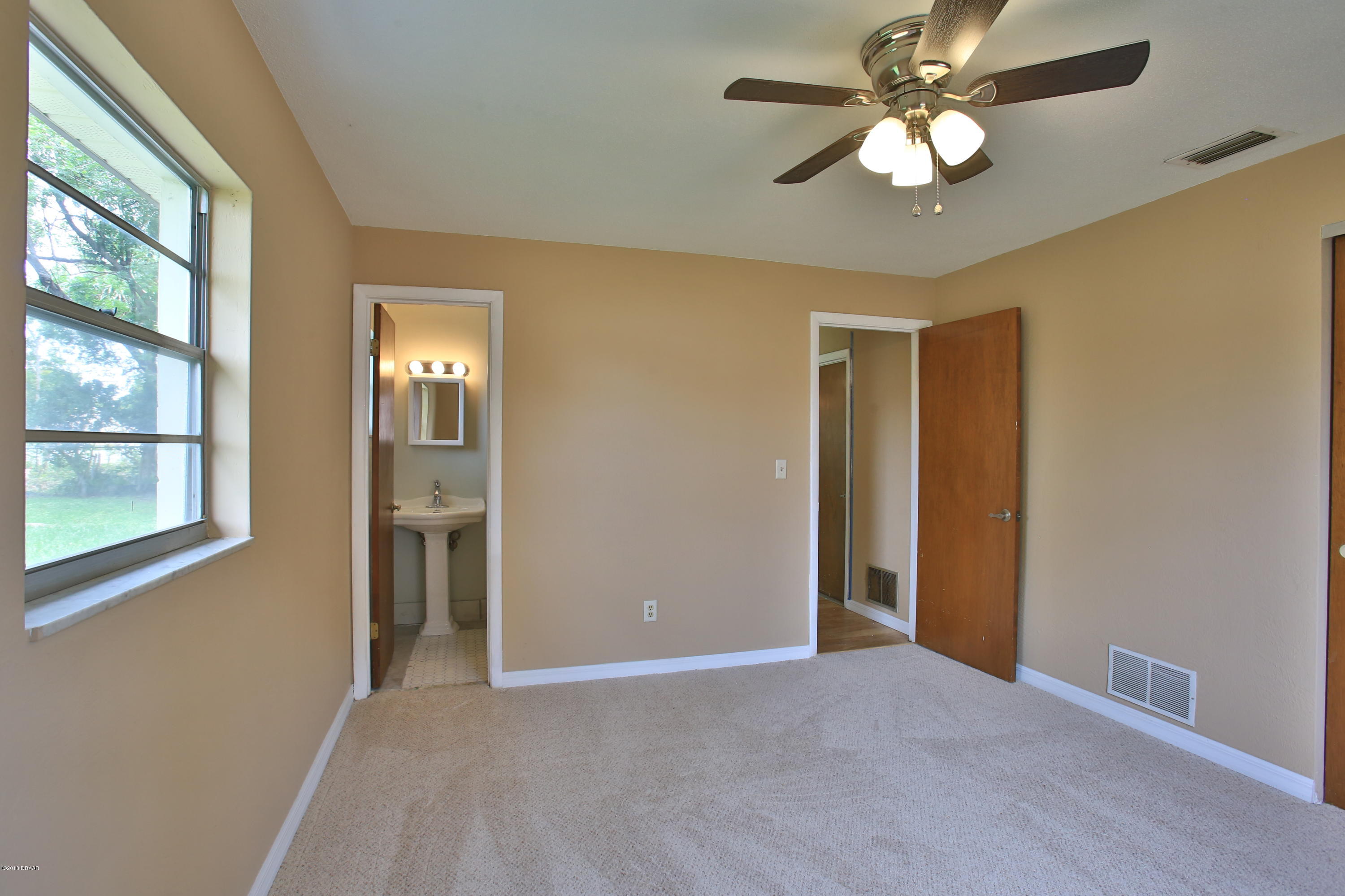 22 Raintree Drive Port Orange, FL 32127 - Photo 11 of 17 closet & bath