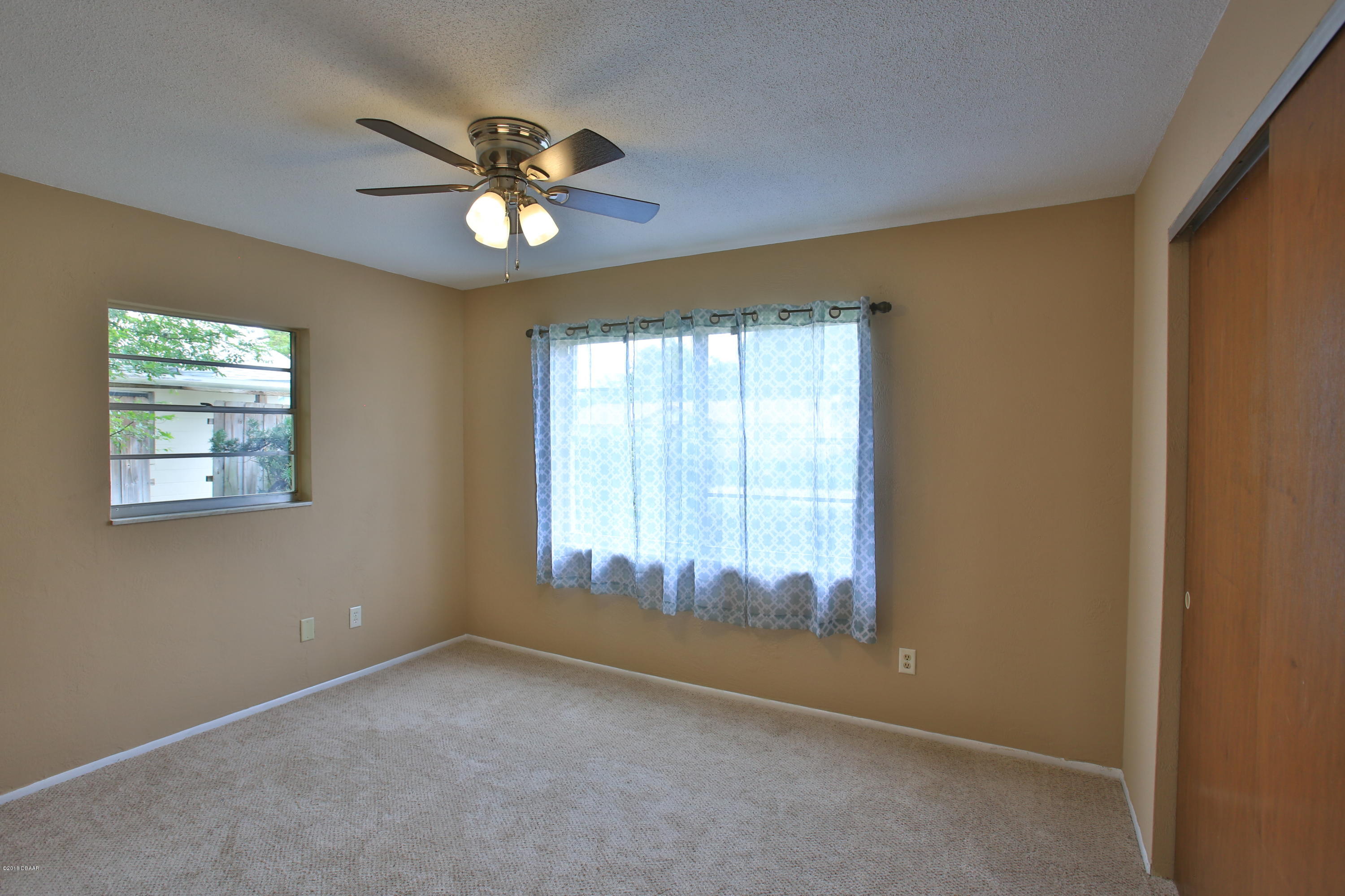 22 Raintree Drive Port Orange, FL 32127 - Photo 13 of 17 front 2nd bedroom
