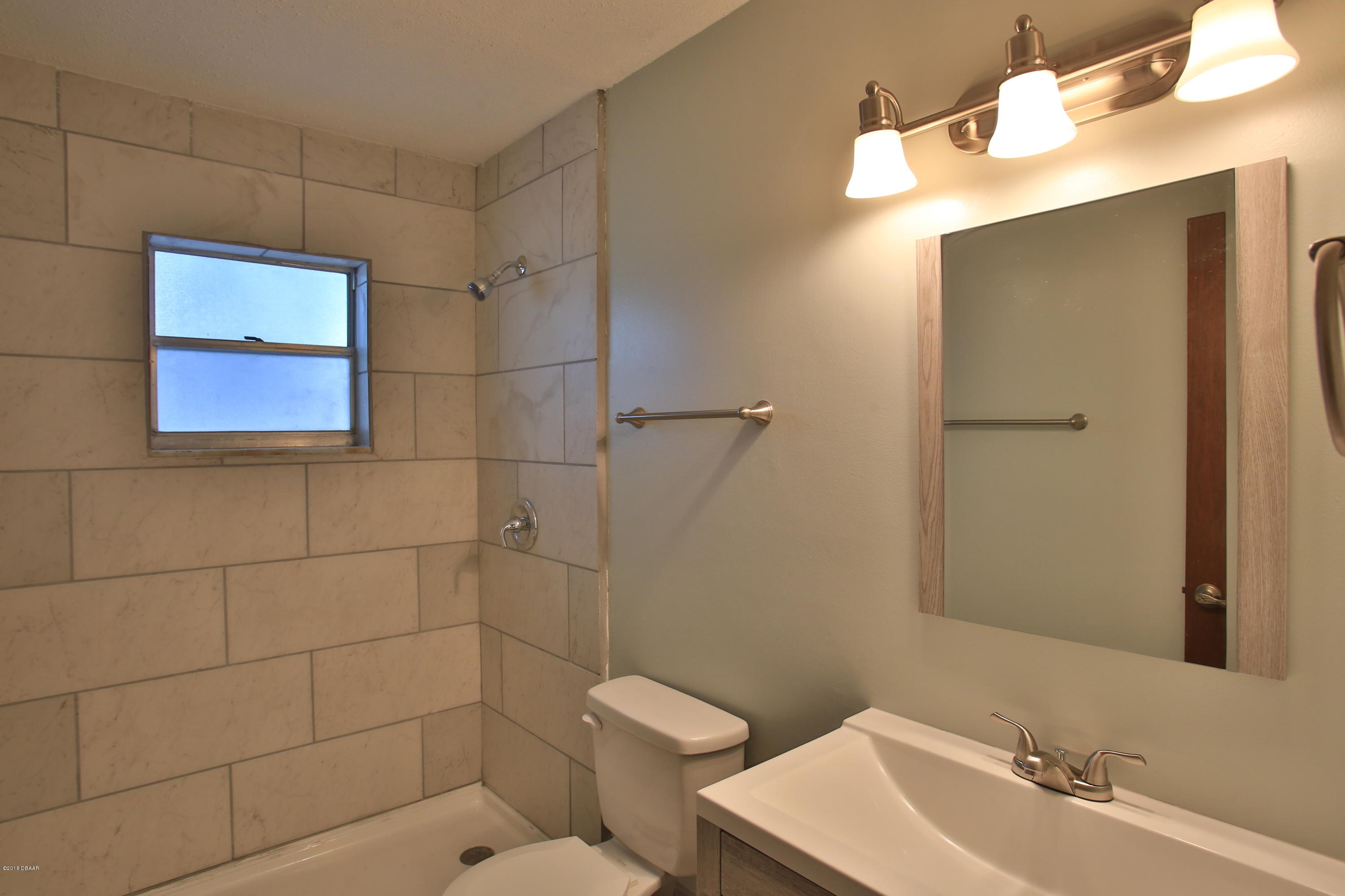22 Raintree Drive Port Orange, FL 32127 - Photo 14 of 17 Remodeled 2nd bath