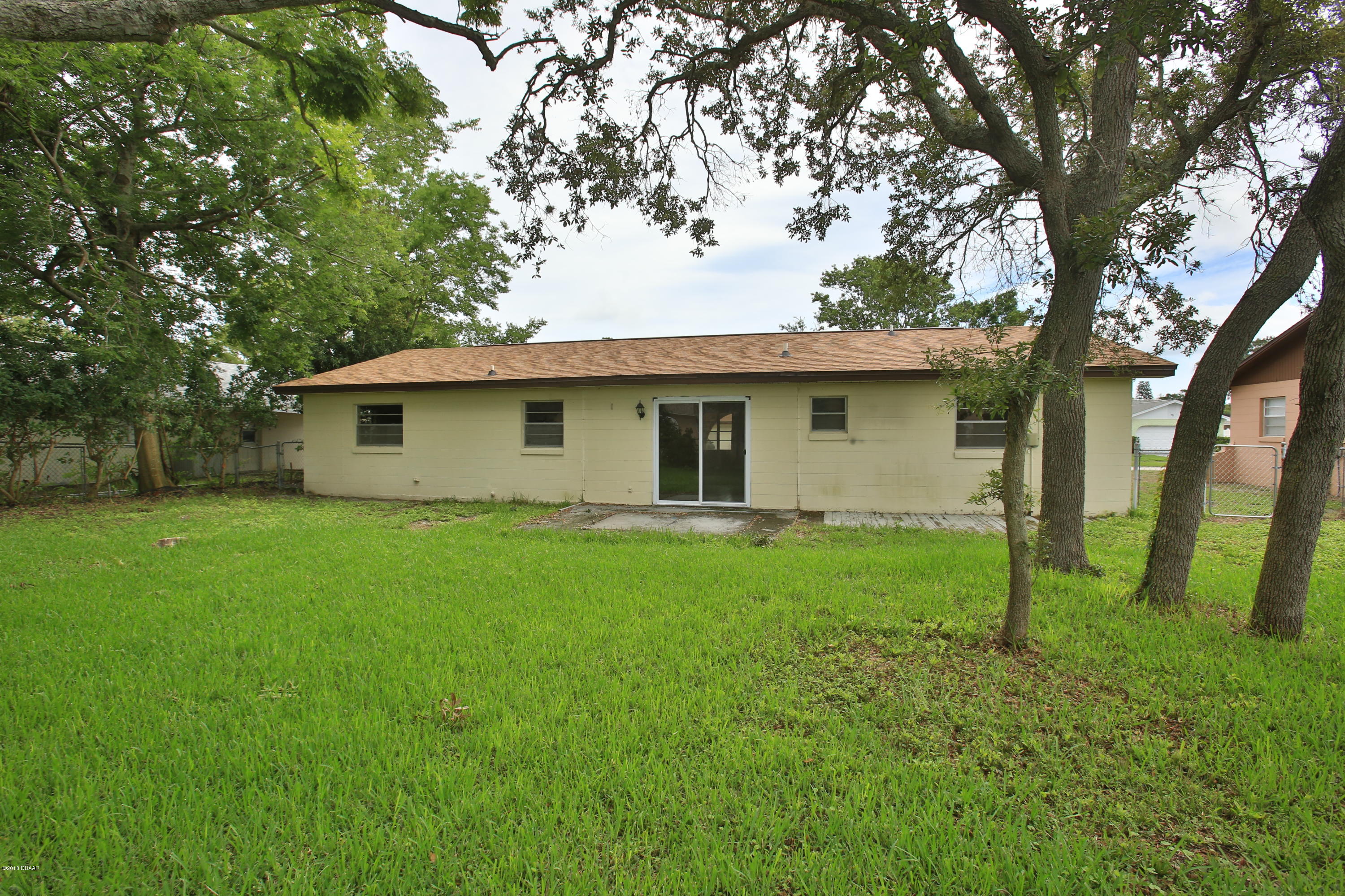 22 Raintree Drive Port Orange, FL 32127 - Photo 16 of 17 BIG fenced Back Yard