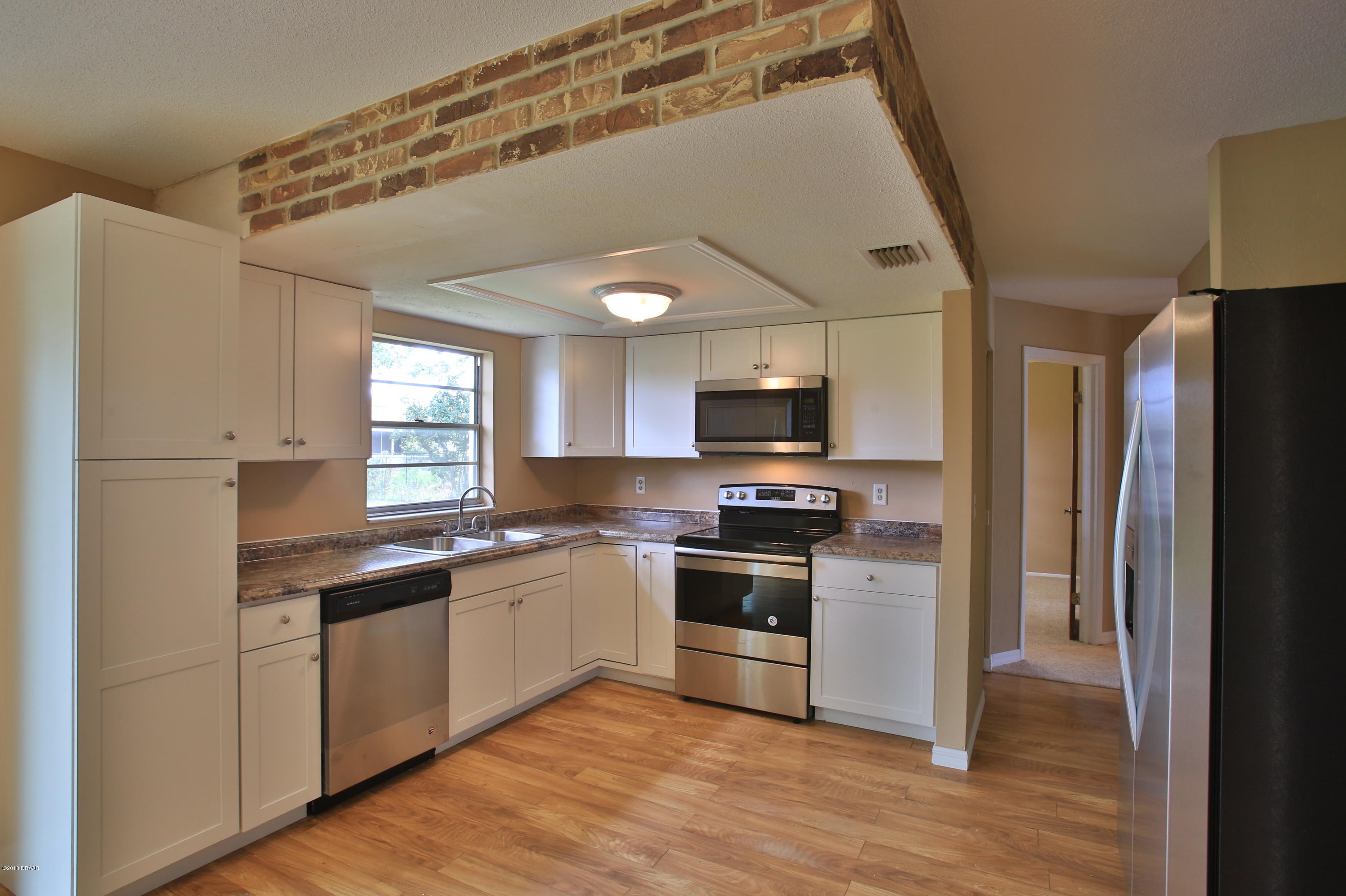 22 Raintree Drive Port Orange, FL 32127 - Photo 5 of 17 Remodeled kitchen new appliances