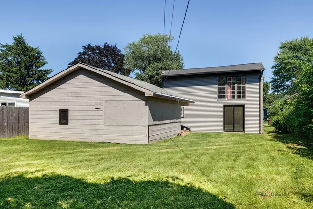 a house view with a garden space