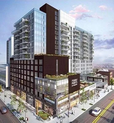 a view of a city with tall buildings