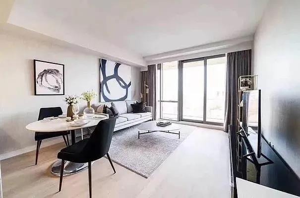 a bedroom with a bed potted plant with the view of bedroom