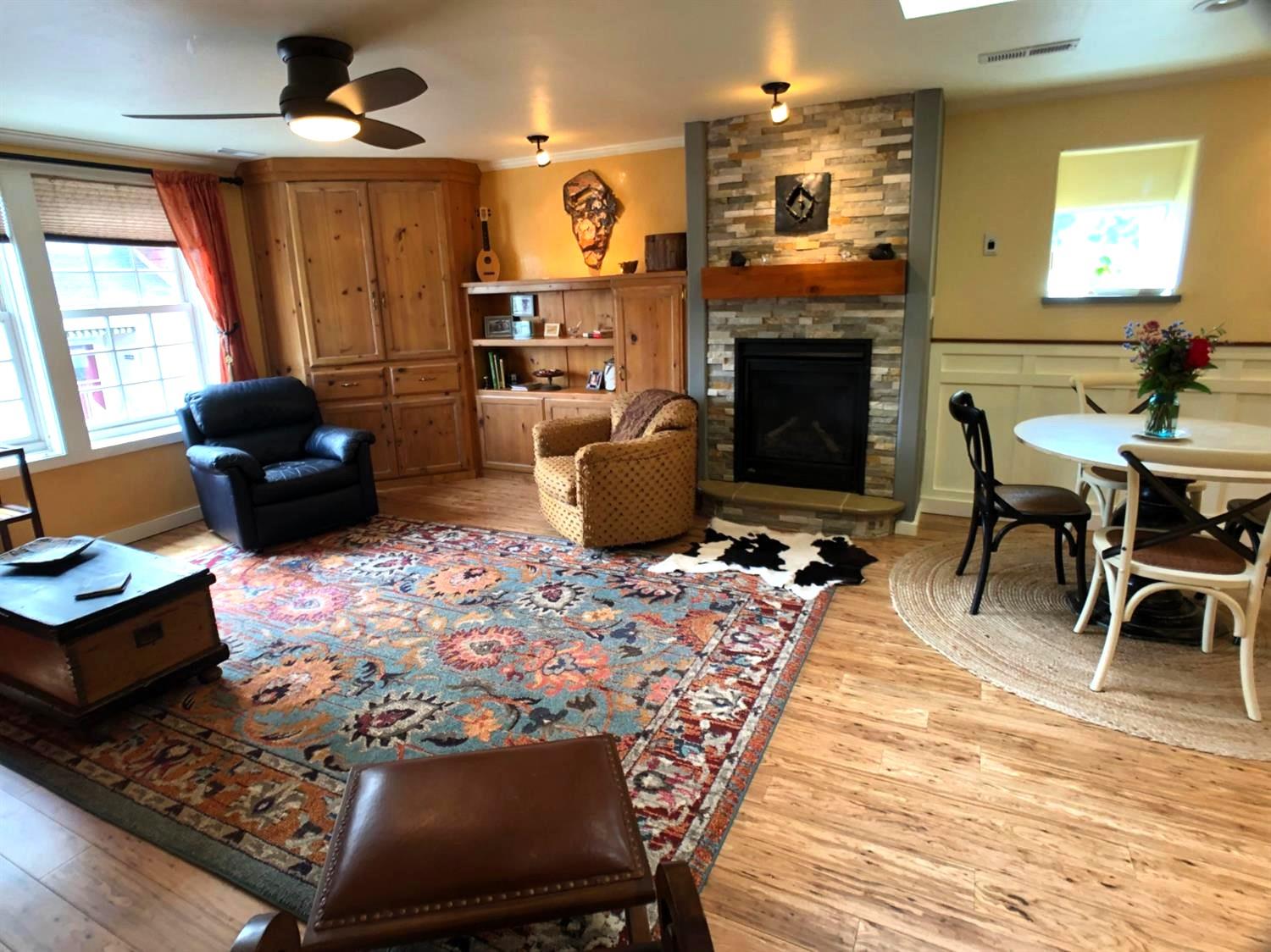 126 Center Street Jackson, CA 95642 - Photo 17 of 79 a living room with furniture and a fireplace