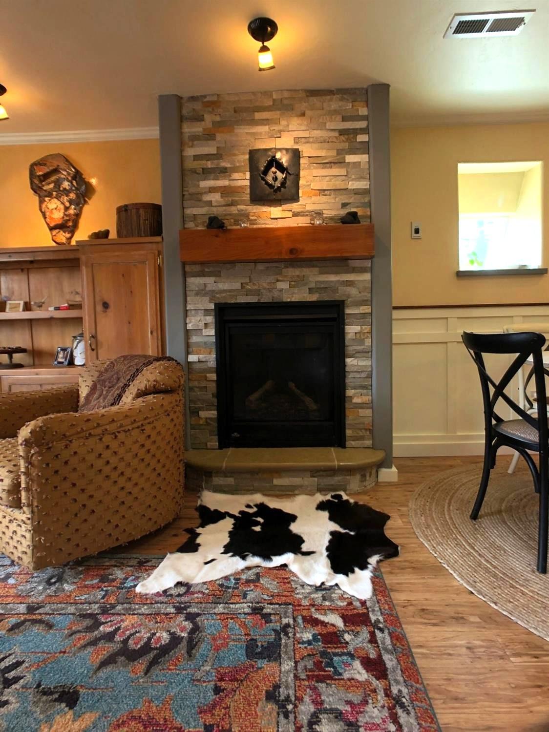 126 Center Street Jackson, CA 95642 - Photo 19 of 79 a living room with furniture and a fireplace