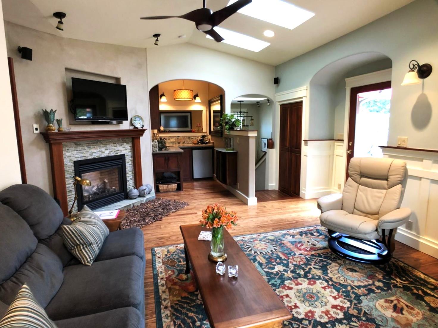 126 Center Street Jackson, CA 95642 - Photo 2 of 82 a living room with furniture and a fireplace