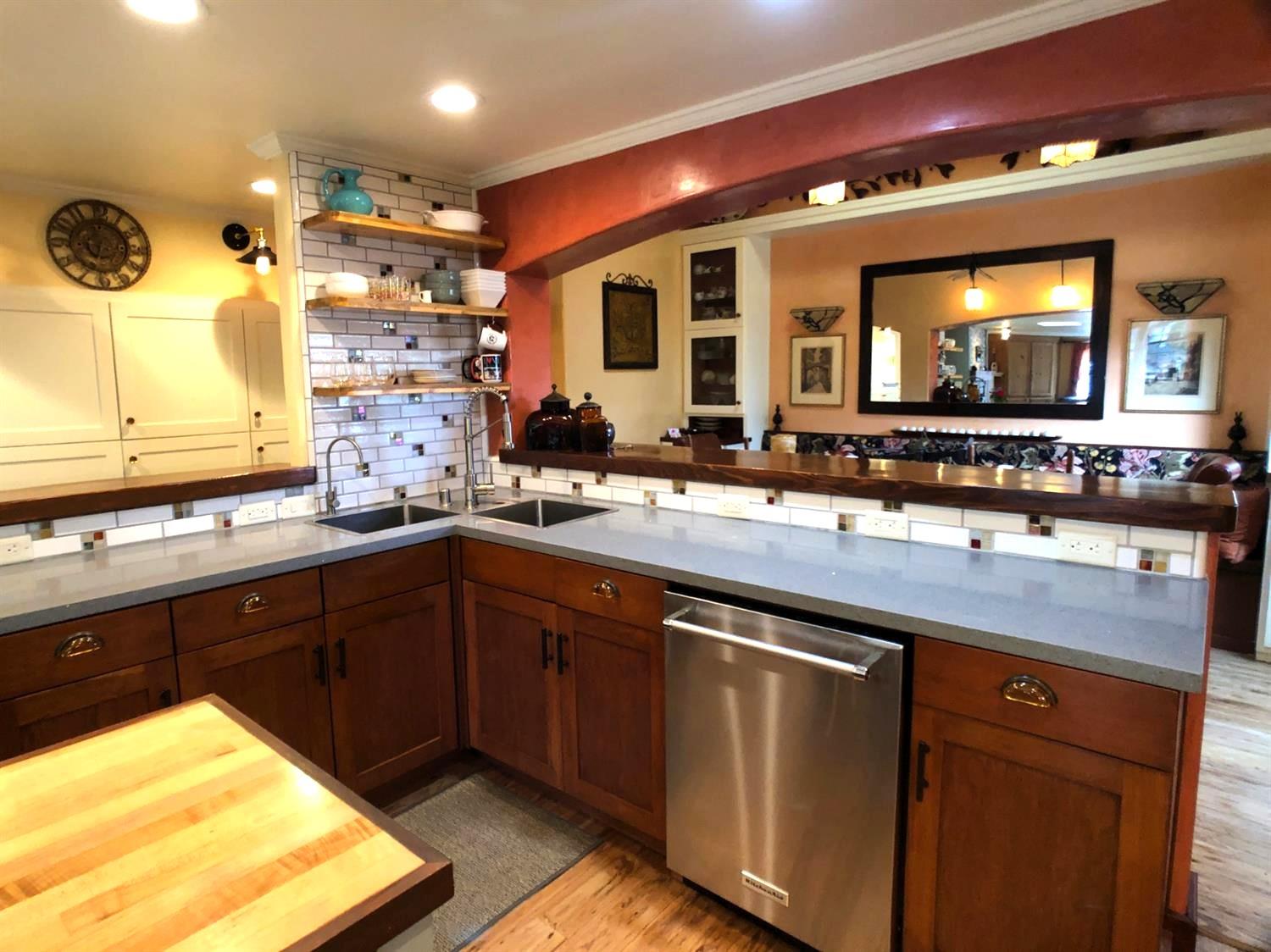 126 Center Street Jackson, CA 95642 - Photo 24 of 82 a kitchen with lots of counter space and a sink