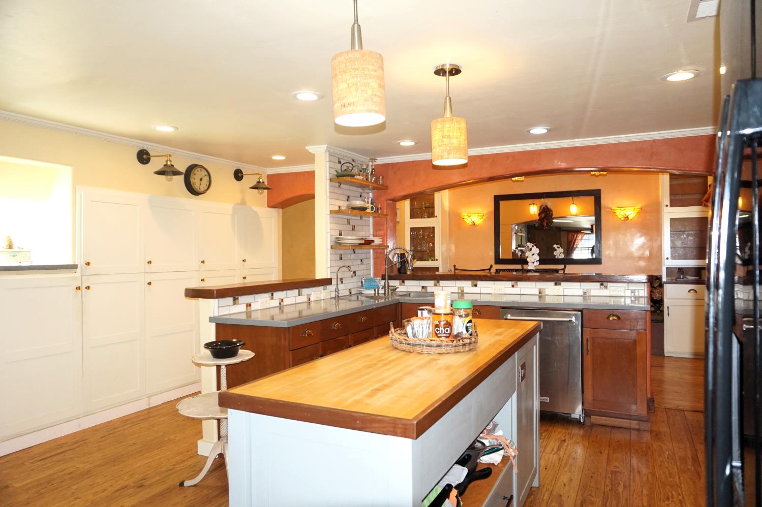 126 Center Street Jackson, CA 95642 - Photo 25 of 82 a kitchen with a sink stove and wooden floor