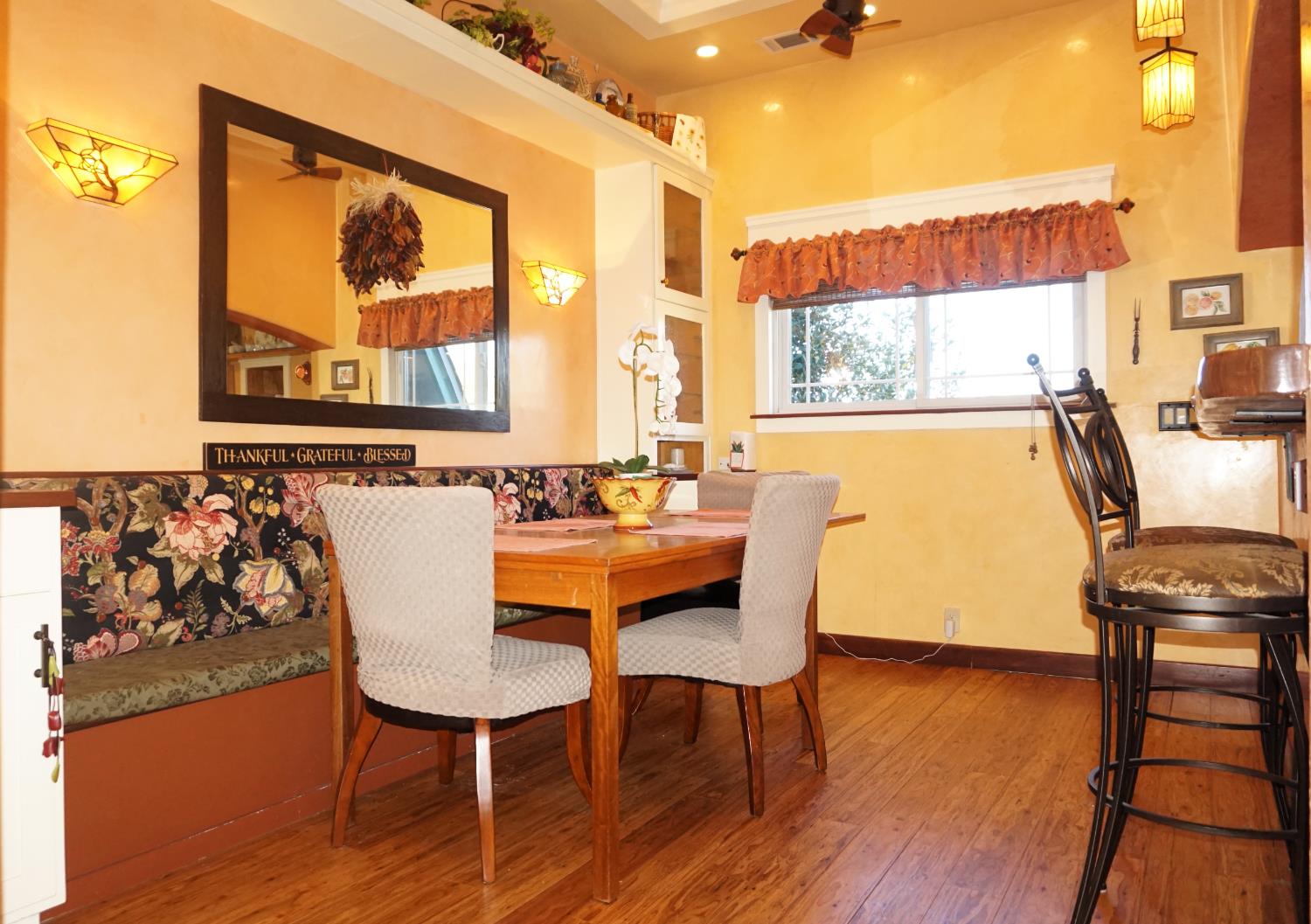 126 Center Street Jackson, CA 95642 - Photo 30 of 79 a dining room with furniture and wooden floor