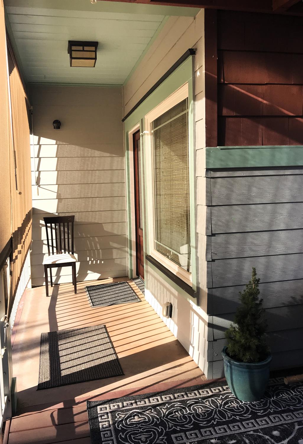 126 Center Street Jackson, CA 95642 - Photo 3 of 79 a view of a patio with a table and chairs and wooden floor