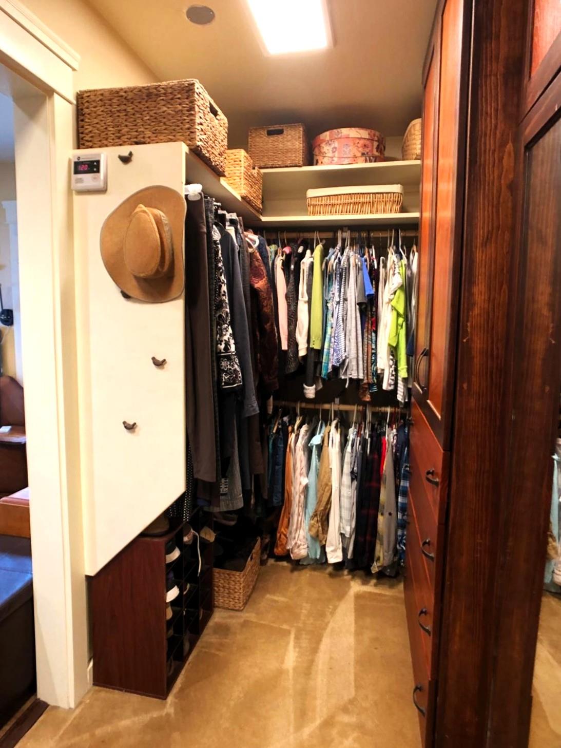 126 Center Street Jackson, CA 95642 - Photo 41 of 79 a view of walk in closet with clothes and shoes