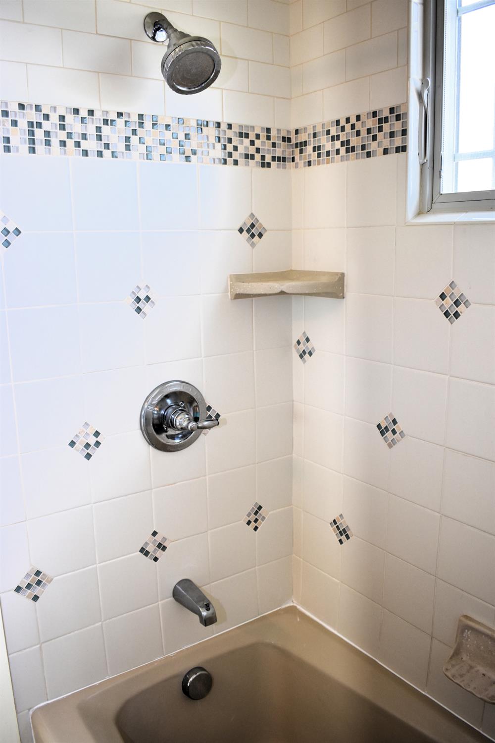 126 Center Street Jackson, CA 95642 - Photo 46 of 79 Main level tub/shower bathroom with custom tile design