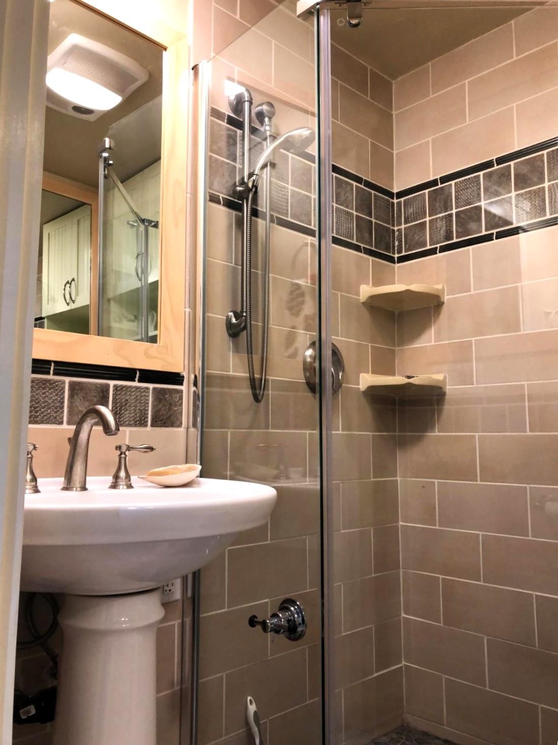 126 Center Street Jackson, CA 95642 - Photo 49 of 79 a bathroom with a sink and a mirror