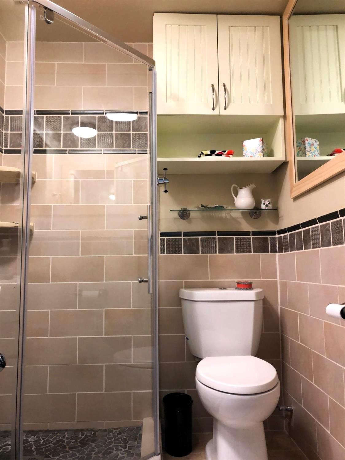 126 Center Street Jackson, CA 95642 - Photo 50 of 79 a bathroom with a toilet a sink and a shower