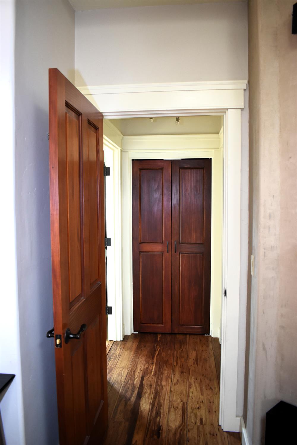 126 Center Street Jackson, CA 95642 - Photo 54 of 79 Solid wood doors and beautiful flooring and trim detail throughout home. Upper level hall door to bed/bath to create private retreat with hall closet for additional storage